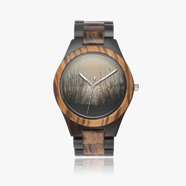 Looking through reed.  Ebony Wooden Watch. Designer watch by Ingrid Hütten